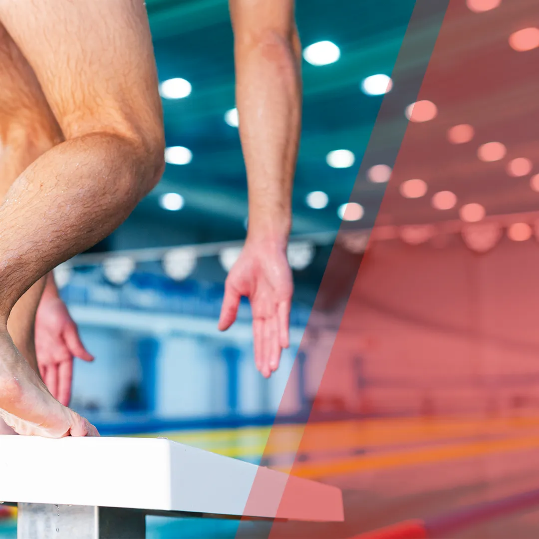 Swimmer preparing for a racing start